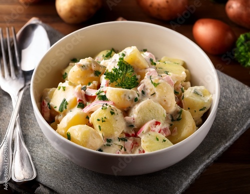 potato salad in white bowl