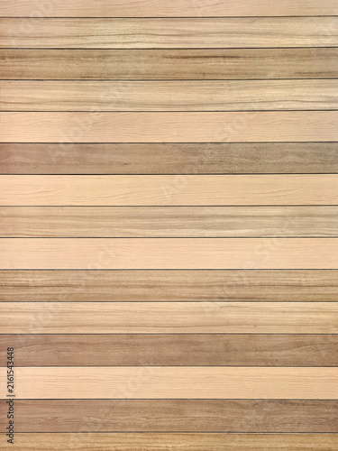 Photography Background of horizontal row cedar wall panels with varying shades of a natural brown