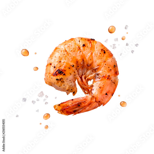 Single grilled shrimp with salt and oil isolated on a white and transparent background.