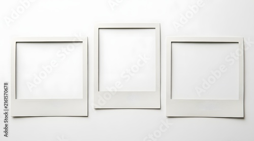 Three empty vintage square photo frames arranged in a row isolated on a clean white background for your creative picture display and memory project