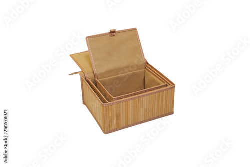 Set of bamboo boxes for storage isolated, Set of three bamboo storage boxes with lids isolated on white background