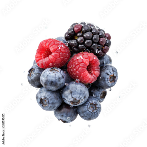 Fresh mixed berries including raspberries blueberries and blackberries isolated on transparent background