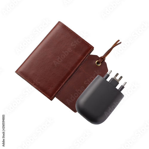Brown leather travel adapter case with plug and charging accessories isolated on transparent background