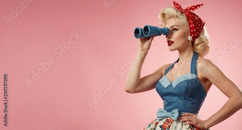 Pin-up Girl with Binoculars on Pink Background
