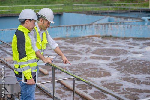 Environmental engineers work at wastewater treatment plants,Water supply engineering working at Water recycling plant for reuse