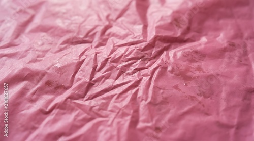 Uneven Pink Plastic Wrapper Surface Abstract Wrinkled Material Pattern plastic texture pink background wrapping paper uneven patchy material synthetic abstract surface oil stains sheet wrapper