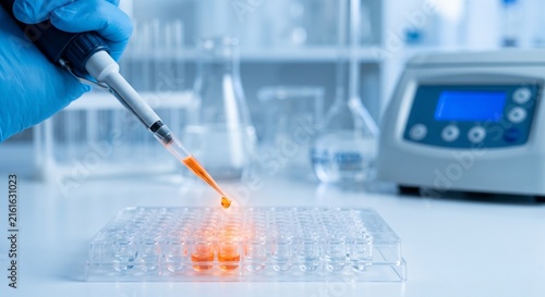 Micro Pipette Dropping Glowing Liquid Cell Culture Plate Lab