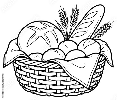 Fresh bread in a woven basket with wheat stalks
