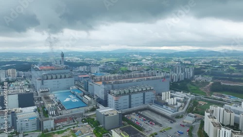 Aerial Drone View of Advanced Semiconductor Chip Manufacturing Plant and Industrial Complex in Icheon, South Korea