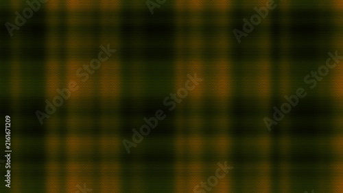 Blurred plaid pattern in dark green and burnt orange tones