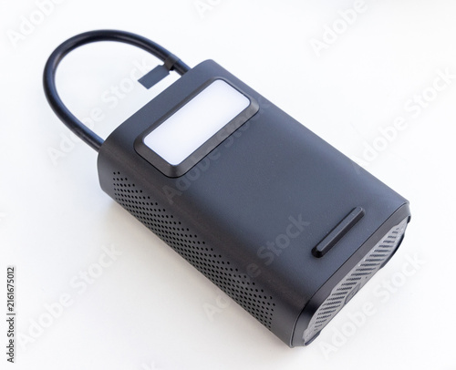 Compact Black Portable Air Pump with Integrated Hose and Display
