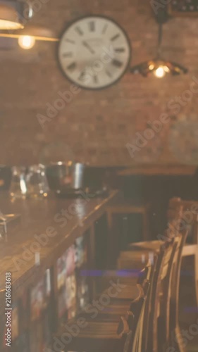 Bright spots of light against interior of a modern bar
