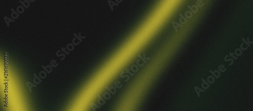 Abstract grainy gradient background with soft yellow light leak and dark cinematic noise texture