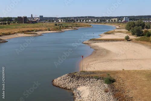 The River Rhine in Arnhem in the Netherlands is extremely low due to the hot summer (2026). The beaches that have formed are larger than normal and people are recreating here.