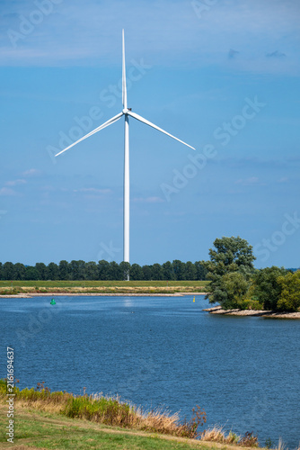 Photography Modern wind turbine generating electricity near Schalkwijk.