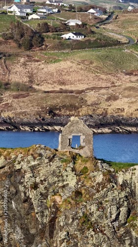Aerial view of the remaining wall of the old coastguard station in Teelin, County Donegal, Ireland