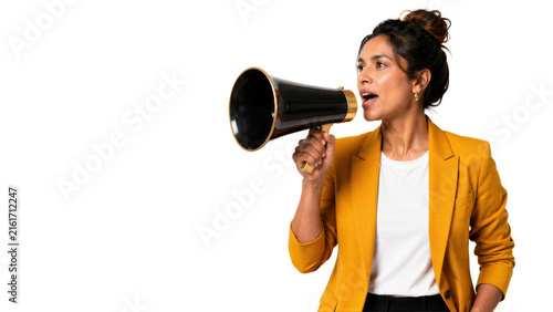 Woman in yellow blazer shouting into megaphone against black background. Advertising, marketing, public announcement, protest, business.