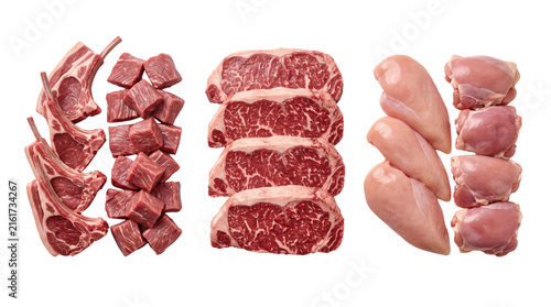 Raw meat assortment on white background, fresh beef steaks and lamb chops, chicken breast and diced pork meat for butchery