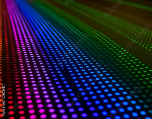 Abstract digital art with vibrant neon pixel grid pattern.