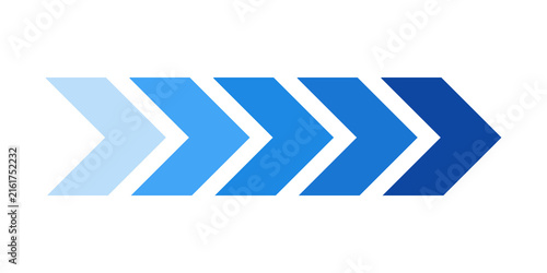 Fotografie Five blue chevron arrows in a row showing motion and direction with a gradient c
