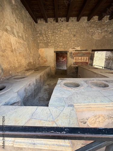 Принти на полотні Ancient Roman thermopolium counter with food jars and fresco, Pompeii, Italy
