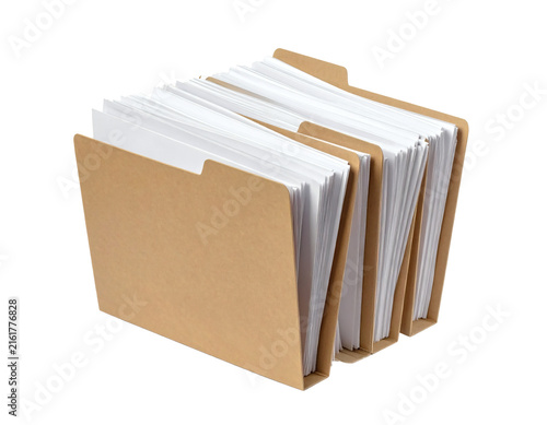 Brown paper file folder containing many white sheets of documents used for organizing important office paperwork in a professional setting