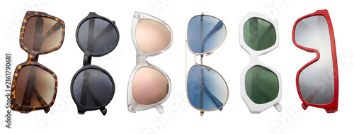 Collection of colorful modern sunglasses with different styles and frames, including tortoiseshell, round, and aviator designs, arranged in a row for a fashion accessory concept