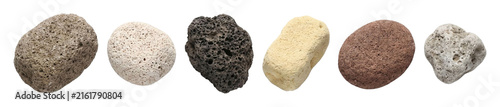 Collection of various colorful pumice stones with a porous, abrasive texture, used as a natural exfoliating tool for foot care, pedicures, and spa beauty treatments