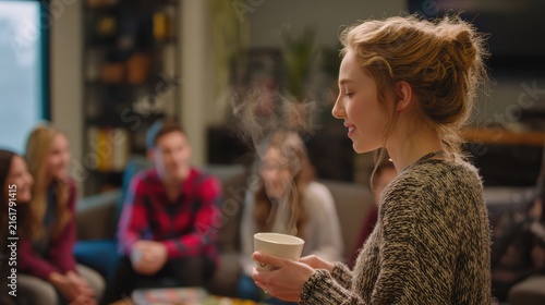 A female therapist handing a cup of tea to a shy teenager in the group, the others are chatting quietly, a scene of hospitality and care, warm steam rising from the cup
