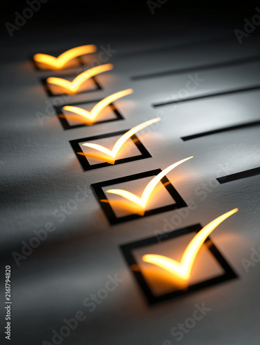 Glowing golden check marks inside squares on a paper document checklist, showcasing survey completion, business task management, and successful quality control