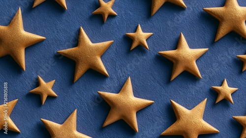 Elegant Seamless Golden Stars Pattern on Blue Background