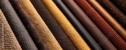 A variety of textured materials are showcased in a diagonal arrangement