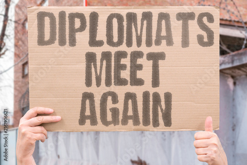 Quadro su tela "diplomats meet again" Negotiators reconvene to address gaps