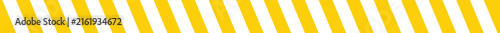 Yellow and white diagonal hazard warning stripes pattern isolated on a white background