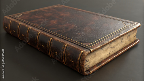 Antique leather bound book with gold detailing on a dark background