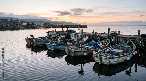 Traditional Fishing Boats at a Quiet Coastal Harbor