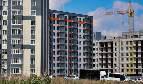 Perspective view of a new residential district with completed and under-construction apartment buildings, showcasing modern urban development and housing expansion. Ust-Kamenogorsk (kazakhstan)