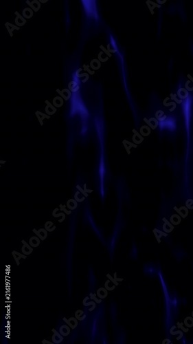 Looping animation of dark blue spectral flame rising over black background for halloween theme, seamless loop motion graphics overlay