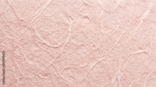 Close-up of Soft Blush Pink Luxury Paper Texture with Elegant Finish