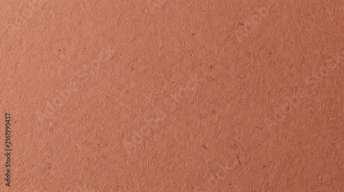 Close-up of Terracotta Paper Sheet Texture with Warm Earth Tones