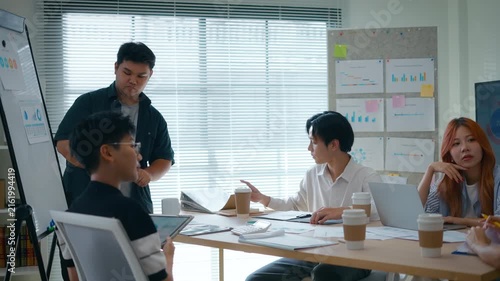 Group of creative Businesspeople brain storm meeting presentation,discussing roadmap to product launch, planning,strategy,dashboard,new business development,working with new startup project in office