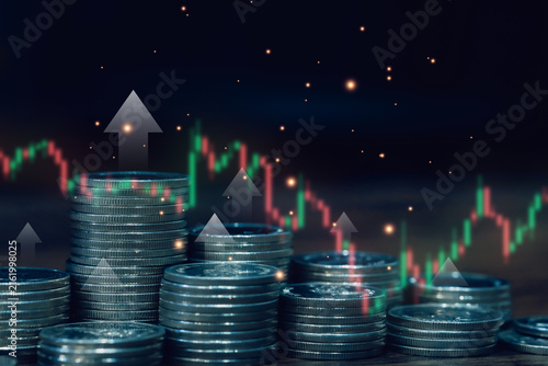 Stacks of coins with upward arrows and stock market chart symbolize investment growth, financial success, rising profits, wealth management, trading, and economic opportunity worldwide.