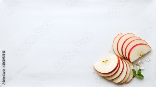 Fresh sliced red apples arranged carefully for culinary preparation in a home kitchen environment providing nutritional snacks for healthy lifestyle choices with vibrant natural fruit textures