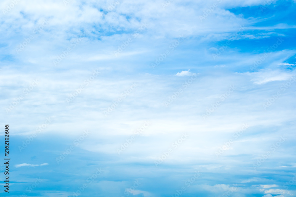 Fototapeta premium Panorama view clear blue sky meets a glowing white horizon, suggesting a serene, open, and with sunlight of beautiful cloudy sky. landscape or nature sky background