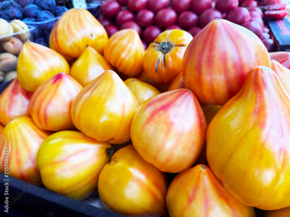 Fotografie Yellow and red striped tomatoes
