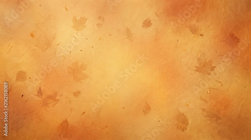Abstract autumn background with subtle maple leaves on textured golden paper surface