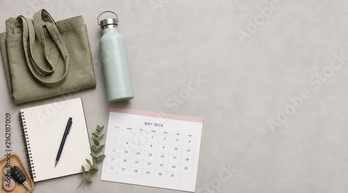 Family planning flatlay with notebook and calendar