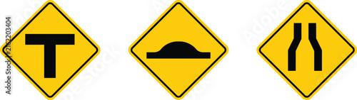 Three yellow diamondshaped road warning signs