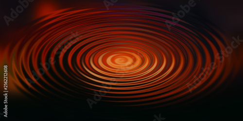 Fotografie Fiery orange circular ripple waves creating hypnotic motion on dark abstract backdrop
