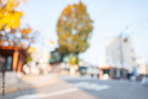 Картината върху платно Abstract blurred old urban residential alley background with local stores and ye